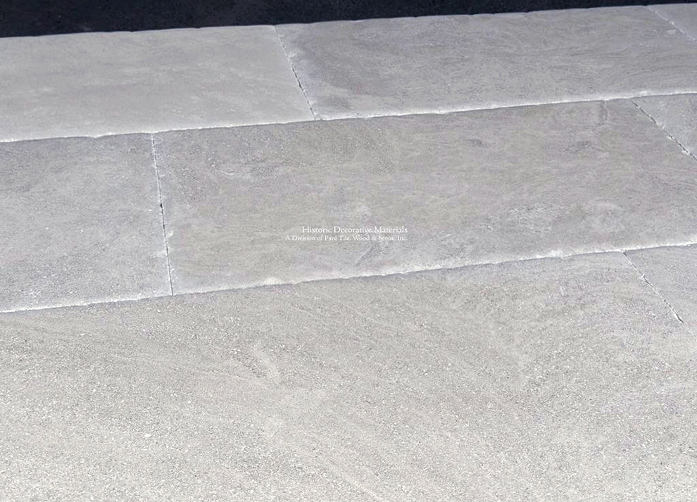 The satin patina of antique French limestone floors brings forth elegance for carriage houses and Brownstones.