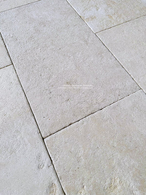 Antiqued French Limestone Flooring | Slip-Resistant Surface for pool surrounds.