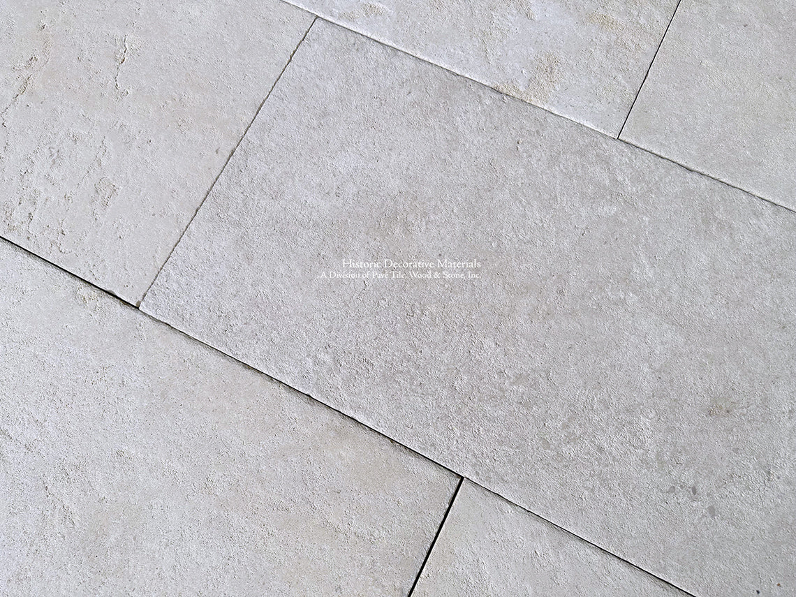 Antiqued French Limestone Flooring | Beautiful white limestone colors for a luxury kitchen floor.