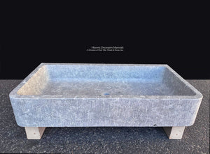 Antiqued French limestone trough sink for luxury kitchen interior design