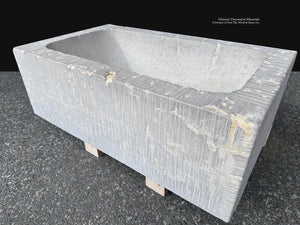 Large natural stone vessel sink for European country house kitchen interiors