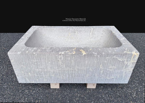 Old-world French stone sink for Provençal and European-inspired interiors