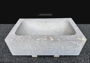 Deep limestone basin for custom vanity and luxury bathroom installation