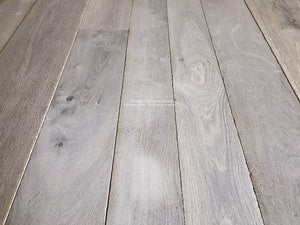 Antiqued French Oak Flooring | Danish whitewashed gray white hues for Belgian farmhouse.