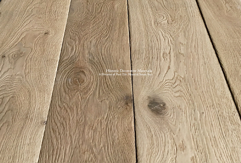 This is a weathered, highly brushed and aged French oak floor with a surface patina that makes for an historic masterpiece.