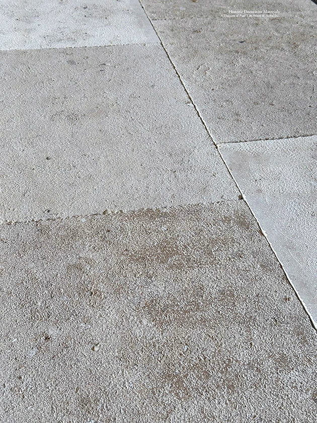 Château de Fénelon Antiqued French Limestone Flooring - the scale of the stone is handsome, anchoring an interior.