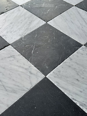 classic European checkerboard marble flooring with aged finish