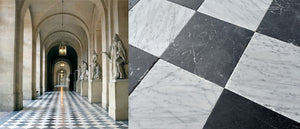 antiqued black and white checkerboard marble flooring in historic French chateau
