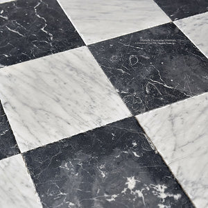 antiqued black and white checkerboard marble flooring with historic patina