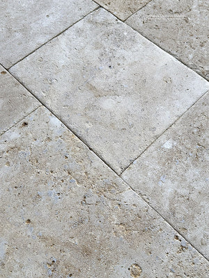 Antiqued limestone flooring for historic manor house great rooms