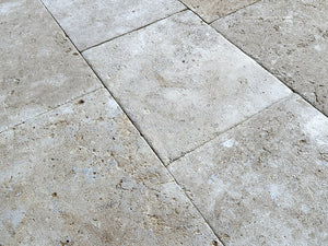 Antiqued limestone flooring for European country kitchens and estates