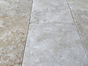Antiqued French limestone flooring for grand entry halls with historic patina