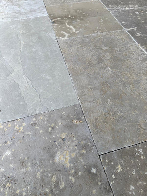 Provence limestone flooring with fossilized surface and timeworn architectural character