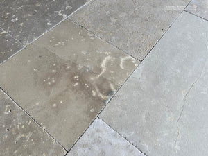 Antique French limestone floor inspired by centuries-old monastic interiors