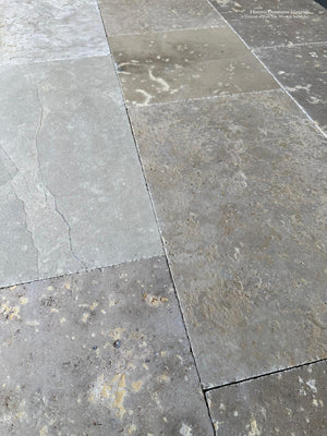 European limestone flooring with authentic aged texture and fossilized detail
