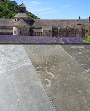 French limestone floor with aged patina and authentic reclaimed stone character