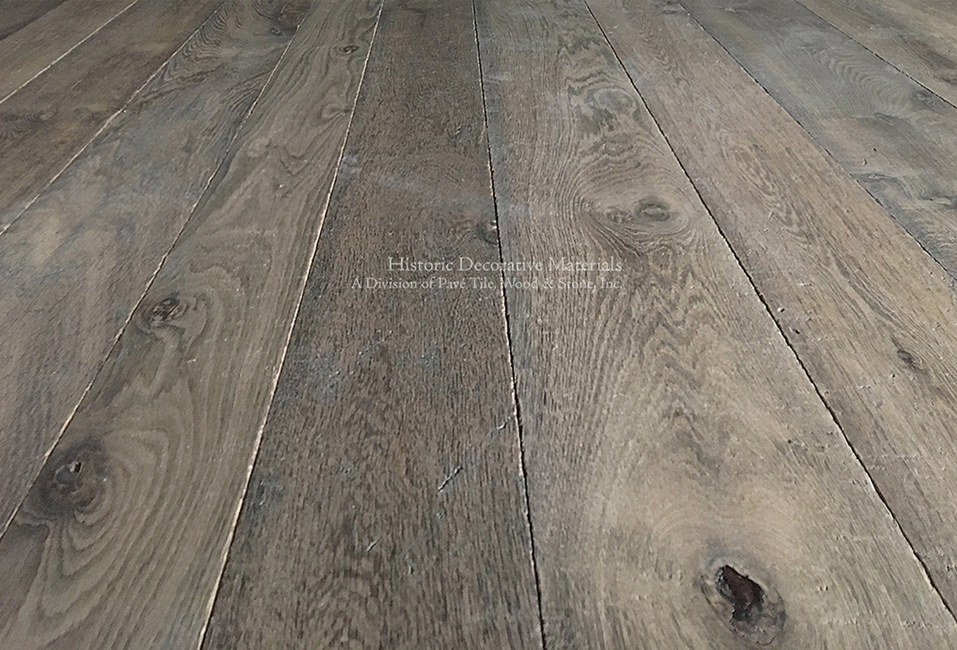 Antiqued French Oak Floors  with historic patina adds a hushed elegance to an interior design.