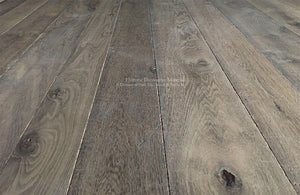 Antiqued French Oak Flooring | A mixture of warm oak and gray oak hues define this patina.