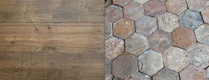 Old French terracotta tiles with natural patina and texture pairs with French oak flooring
