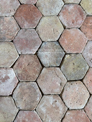 Reclaimed French clay floor tiles with centuries-old patina