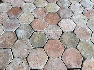 Historic French terra cotta tiles with timeworn surface texture