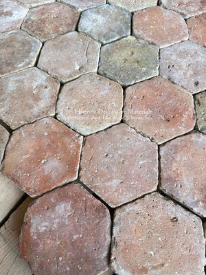 Historic French terra cotta tiles with aged surface character