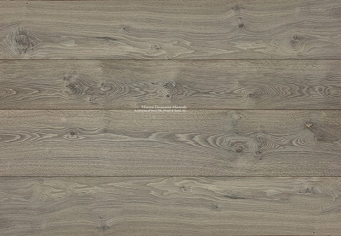 Belgian farmhouse interiors succeed using antiqued French oak farmhouse wood flooring.