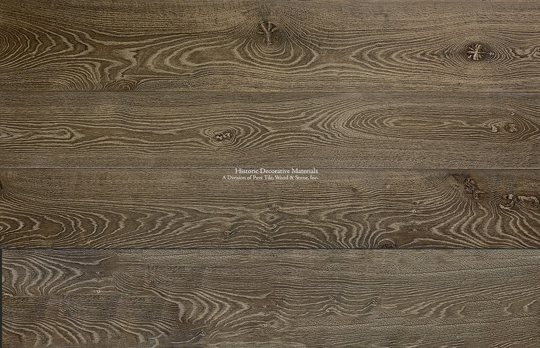 Aged French oak flooring in hand-finished warm oak hues beautify old house interiors.