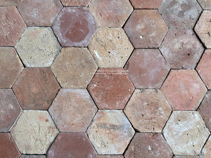 Powder rooms installed with Veules-les-Roses French Reclaimed Terra Cotta Tile Hexagons are lovely.