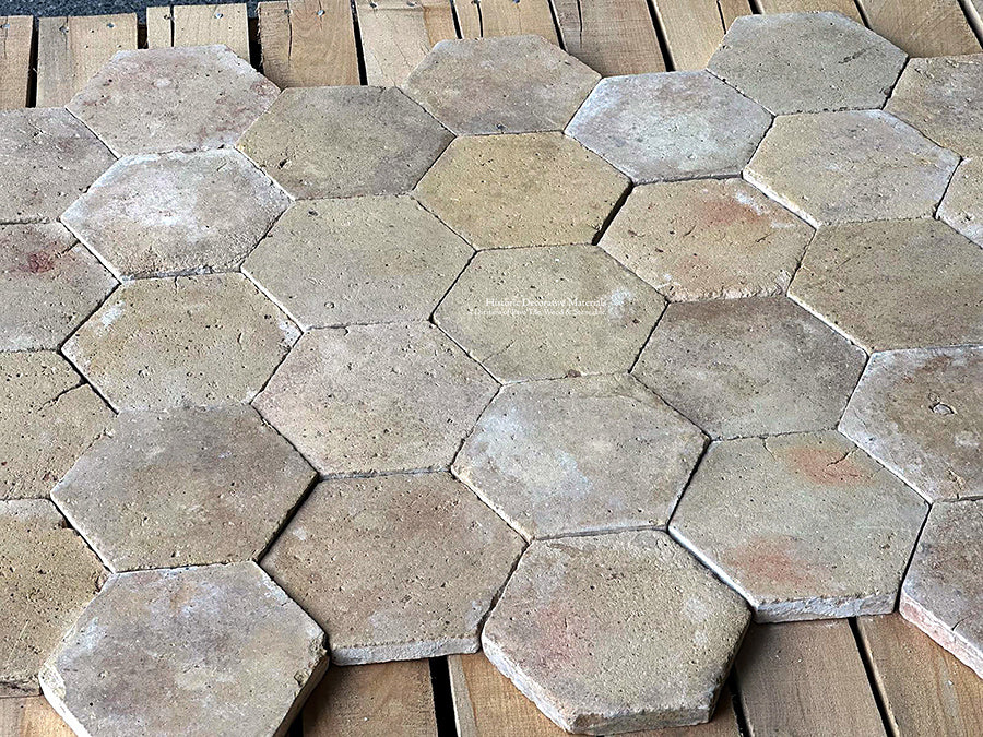 A sun washed  color palette of neutral tones is the perfect hue for an historic French kitchen floor.