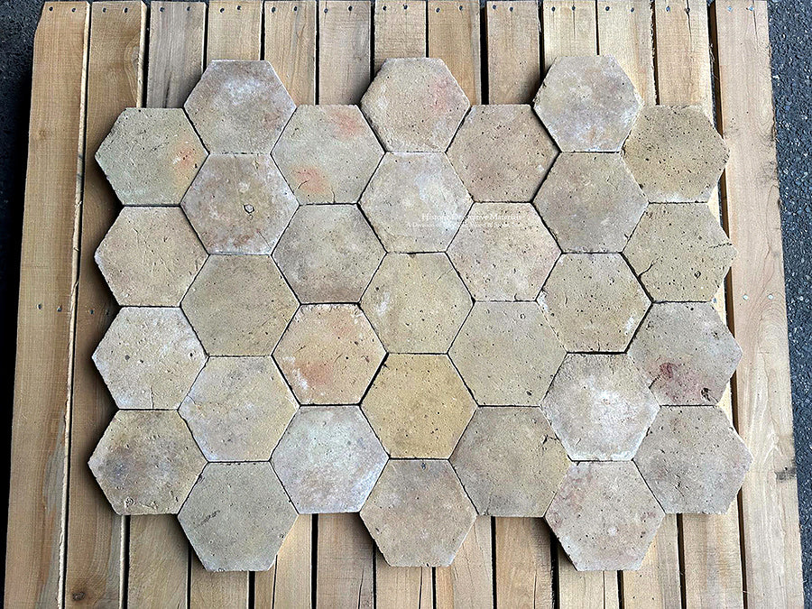 Hidden beneath layers of dust and time, we unearthed each French reclaimed terra cotta tile and cleaned them by hand.