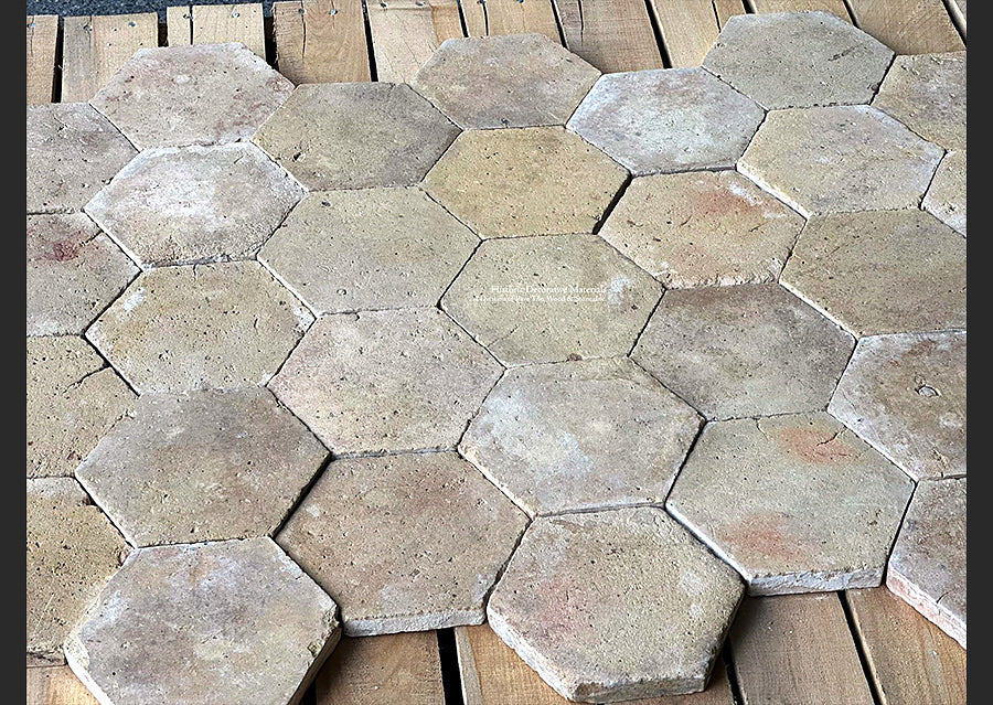 Salvaged from a former cheese shop, this French reclaimed terra cotta tile lot exudes historic France.