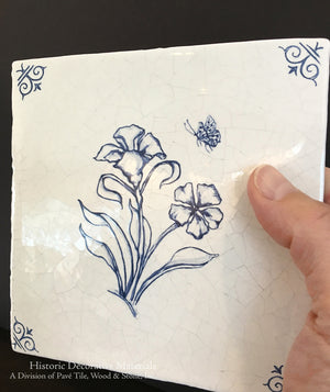 Delft tile hand-painted Dutch flower motifs for kitchen backsplash.