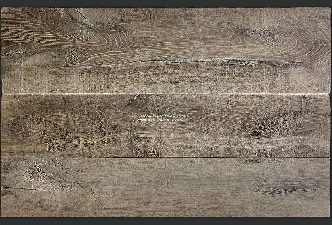 Antiqued French wide plank oak flooring elevates historic and luxury interiors.
