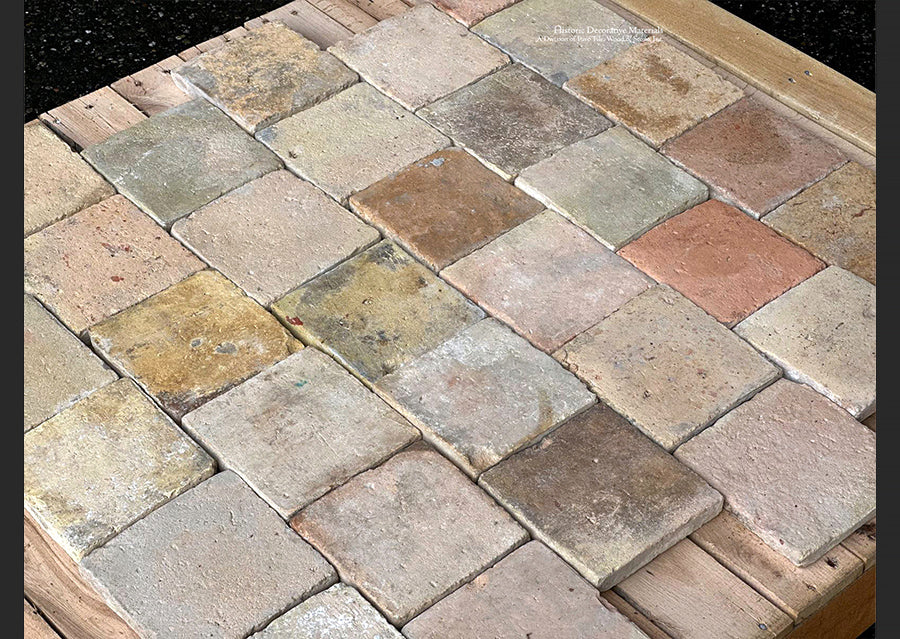 Antique French reclaimed terra cotta tile cobblestones with hues akin to a mid-century decor color palette.