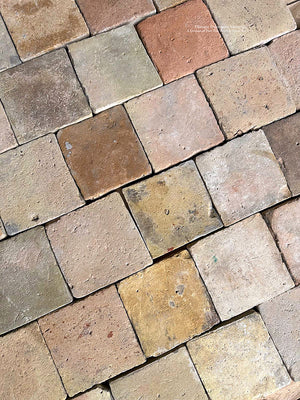 Walking on this antique French terra cotta tile cobblestone floor will transport you back to the 18th century.