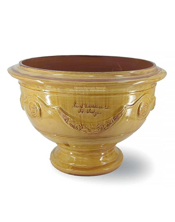This coupe d'Anduze Provençal yellow glaze adds beauty to French garden decor.
