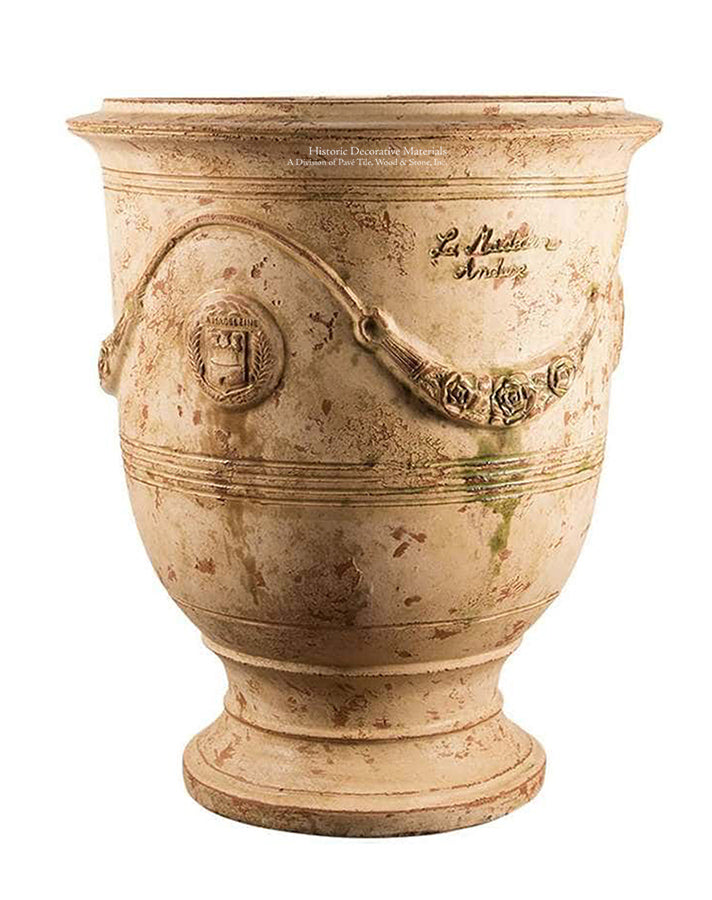 Vintage French pottery in a matte patina is an authentic historic decorative element.