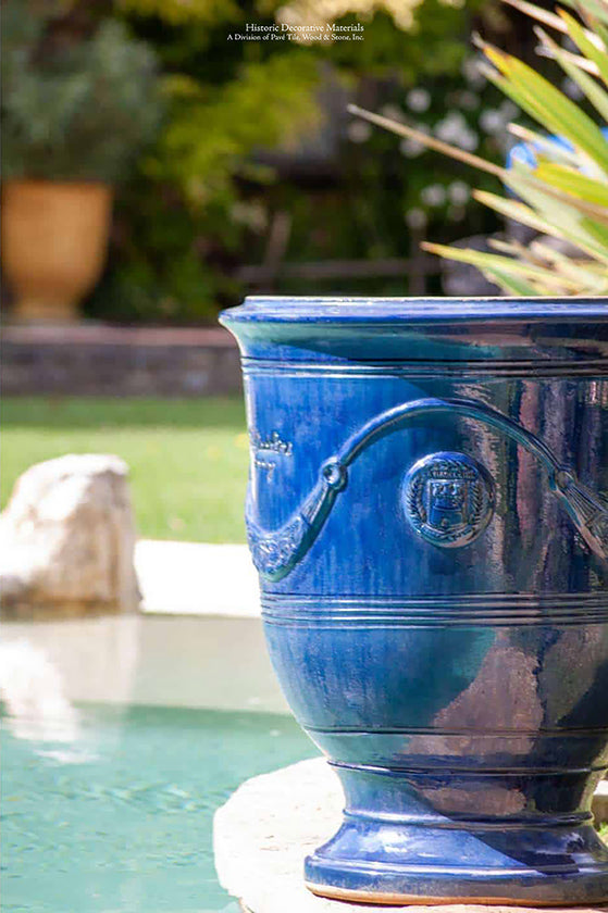 Classic French blue Anduze vases from Provence will bring French elegance poolside.