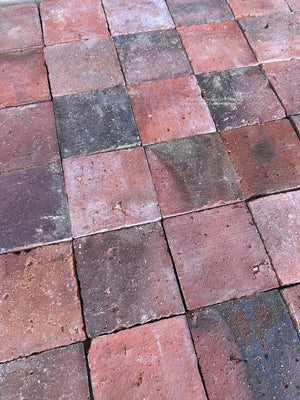 Antique French terra cotta tiles with time-worn patina and handmade irregularities