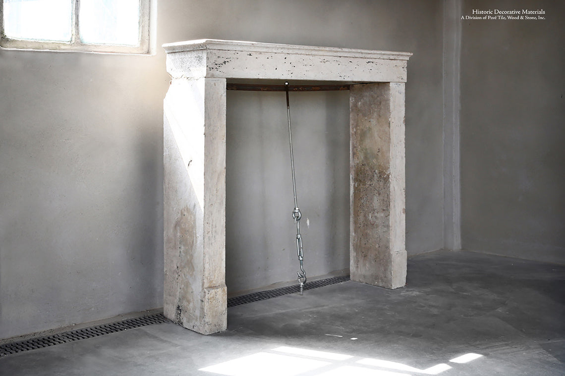 19th Century French Limestone Campagnarde Style Fireplace Mantel