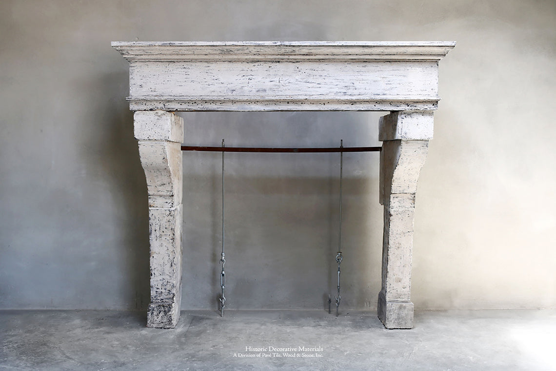 19th Century French Limestone Campagnarde Style Fireplace Mantel