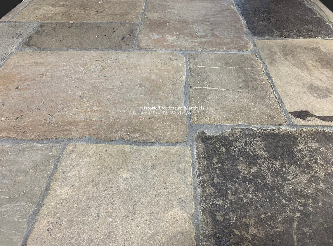 Reclaimed Olde London English Limestone Tiles are salvaged antique pavers around London.