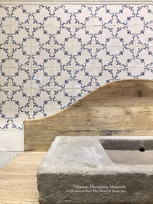  16th Century Italian Decorative Tile: Palazzo installed behind an Italian reclaimed wood and stone vanity