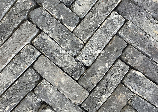 Reclaimed Antique Belgian Bluestone Bricks installed in herringbone pattern.