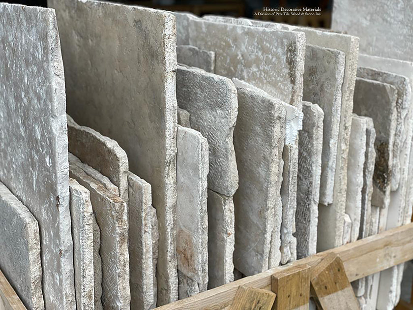 Antique Italian Limestone Floors of cream, gray and ivory colors marry with antique French oak flooring.