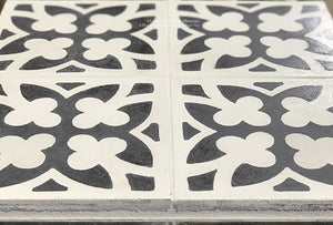 Antiqued by hand to accelerate the surface of the cement tile into a satin patina
