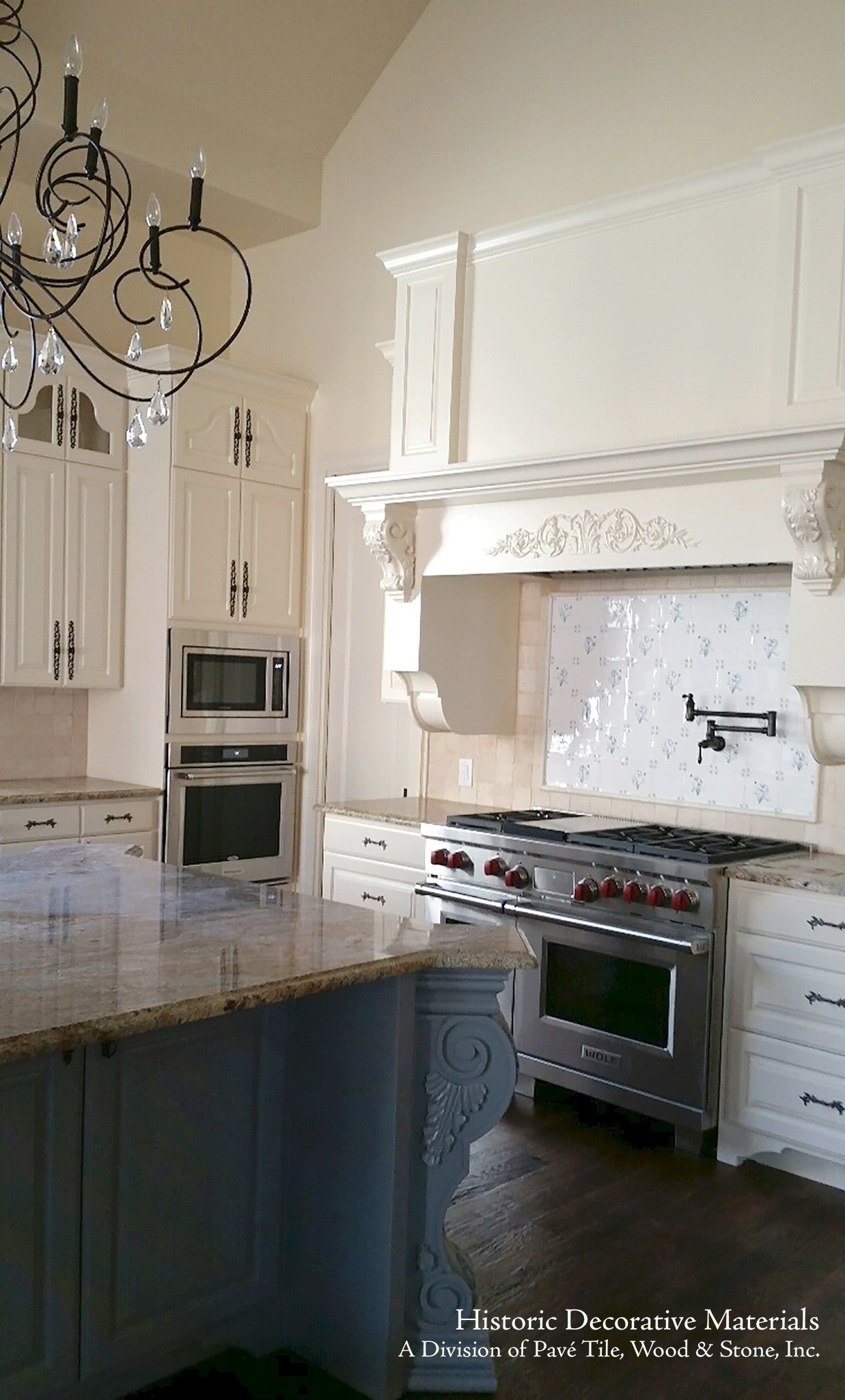 Delft tile backsplash over a range is elegant kitchen decor.