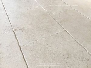 Aged French Limestone Flooring from France Dalle d'Escoffier is a Tone-on-Tone White Limestone with Soft Patina.