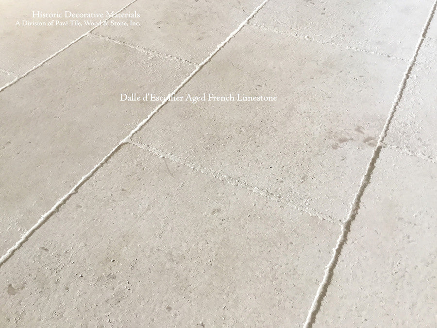 Aged French Limestone Flooring from France Dalle d'Escoffier is a Tone-on-Tone White Limestone with Soft Patina.